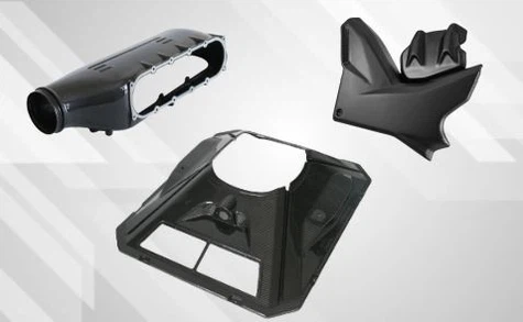 Parts de fibra de carboni